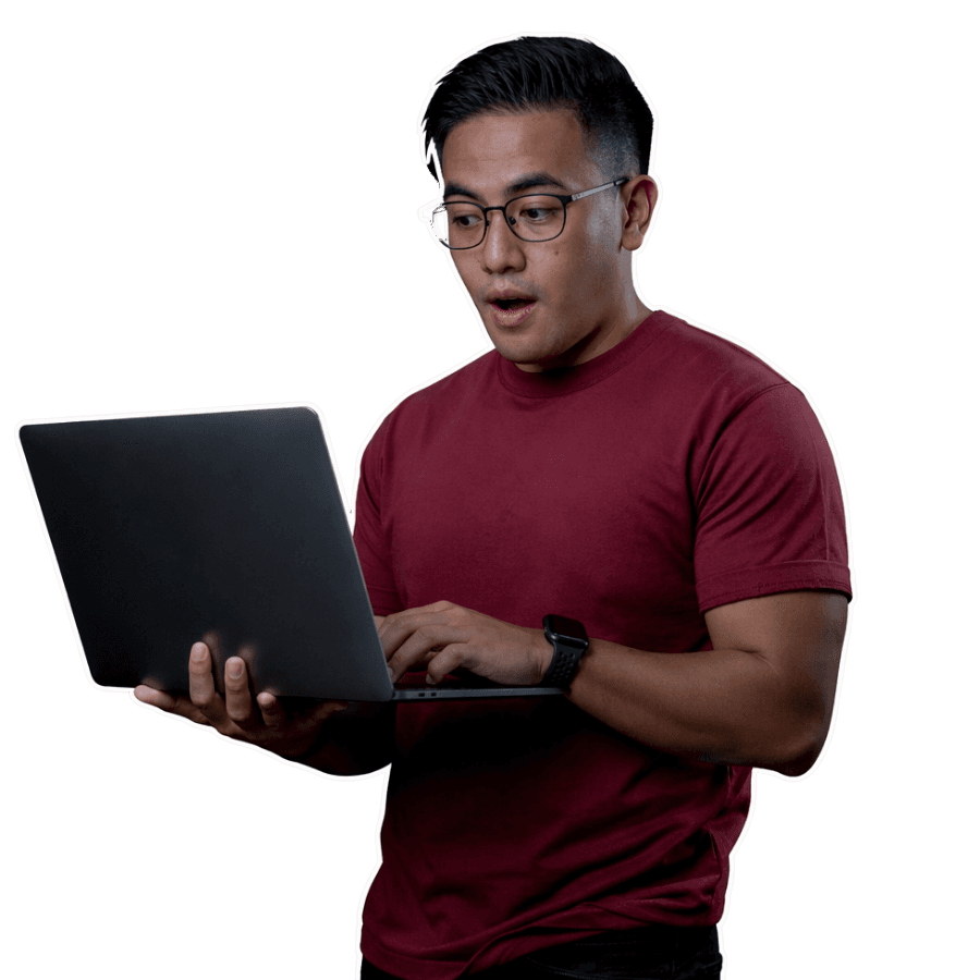 Danny holding a laptop